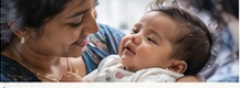 Mother smiling with her healthy infant during maternal awareness programme